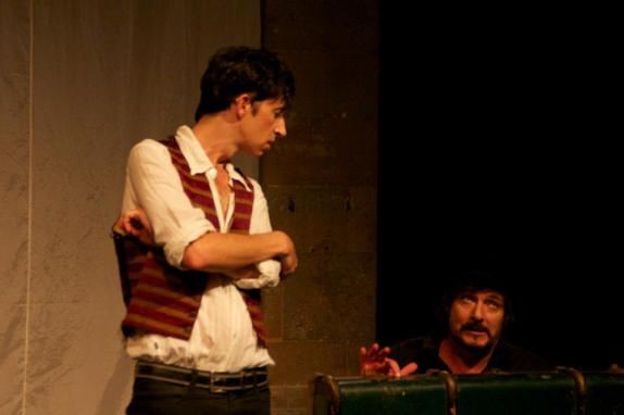 Adrian Hughes and David Thomas performing on stage